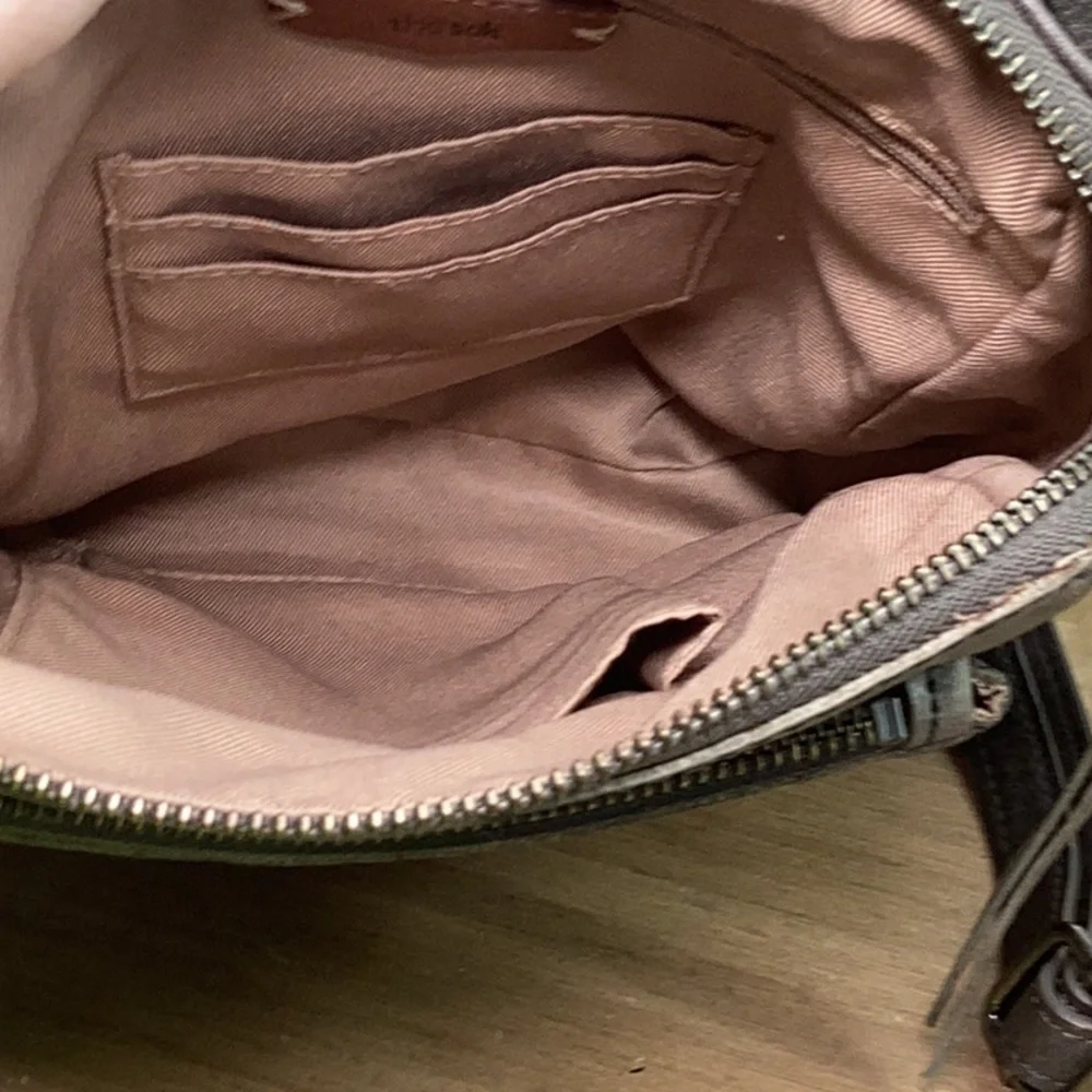 The Sak Leather Gray/ Green Embossed Leather Backpack
